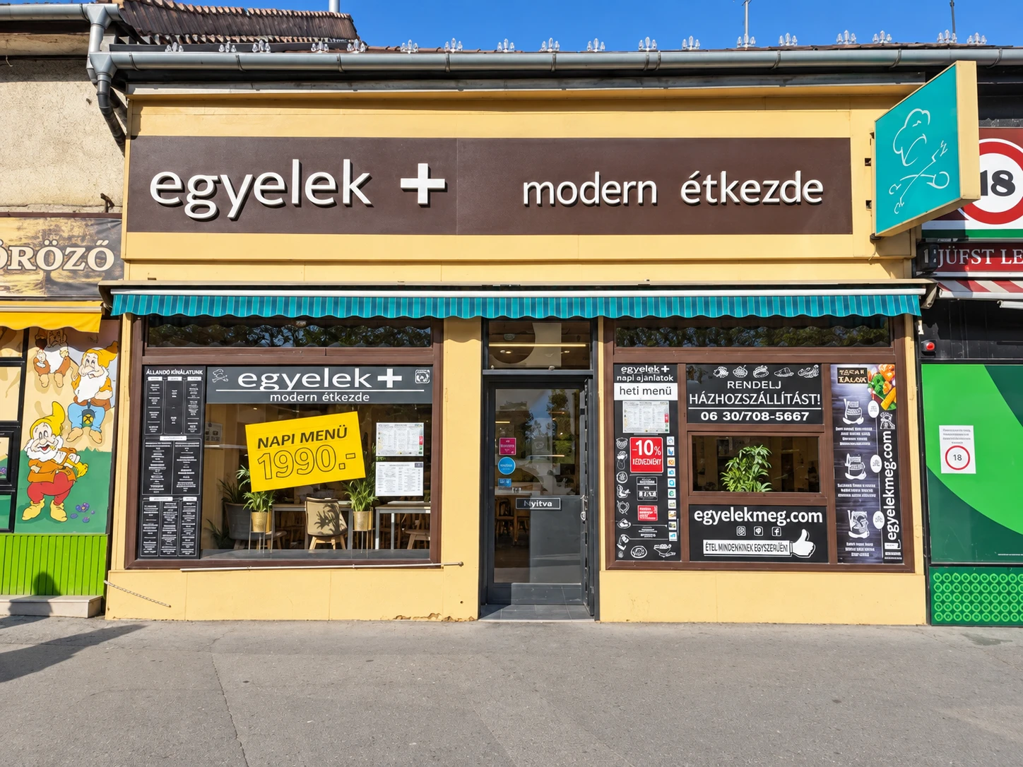 Az Egyelek+ modern étkezde sárga homlokzata az Árpád úton
